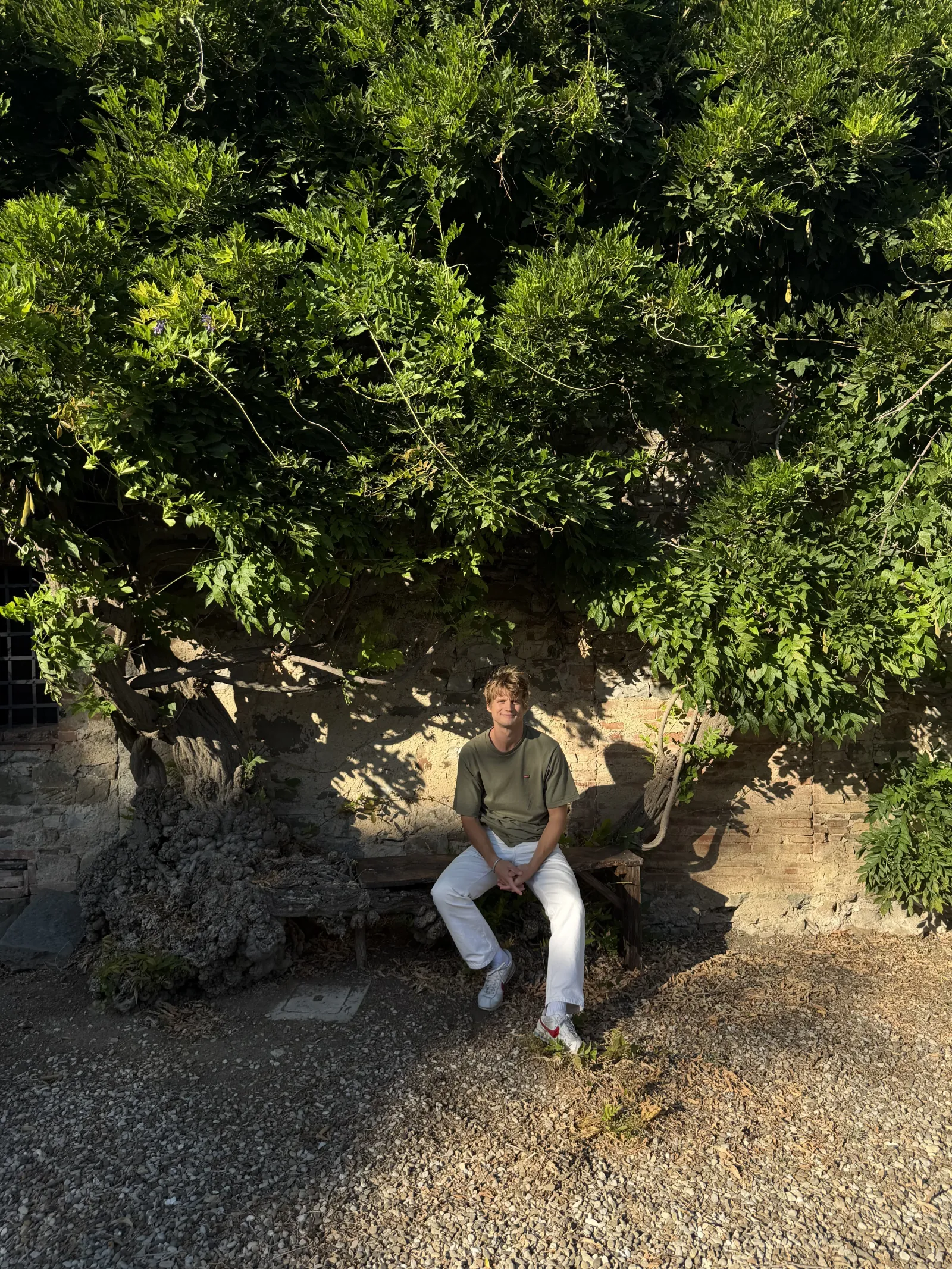 Henrik Dahlberg seated outdoors